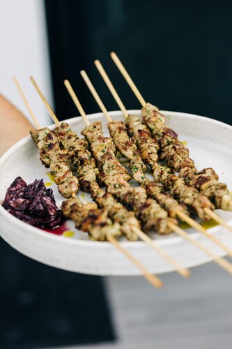 Lamb shoulder skewers garlic olives lemon by massimo mele