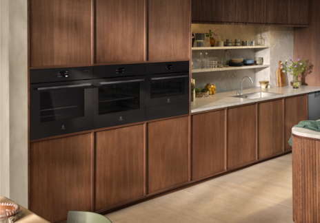 Oven, with fridge and cooktop in a kitchen