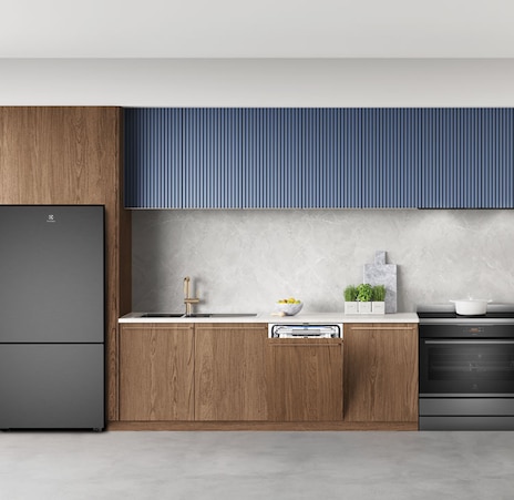Black bottom fridge in clean kitchen