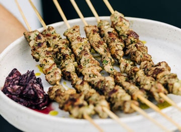 Lamb Shoulder Skewers, Garlic, Olives, Lemon by Massimo Mele